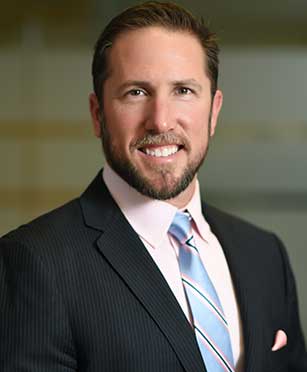 commercial real estate investment company Portrait of Ryan Bennett